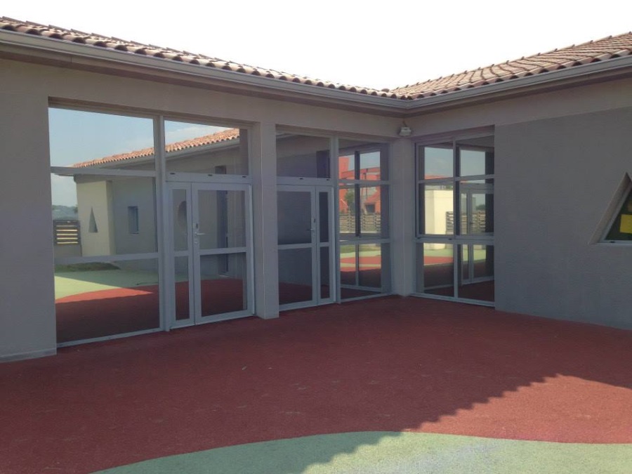 FILM SOLAIRE VITRES BATIMENT 9